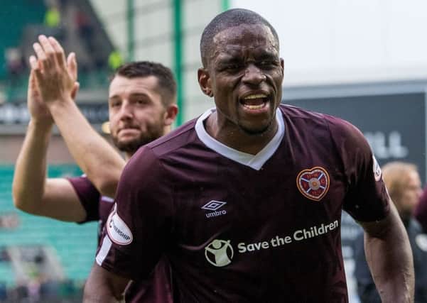 Uche Ikpeazu celebrates at full-time after Hearts' 2-1 win at Easter Road.
