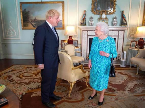 Boris Johnson, on becoming Prime Minister, with the Queen. Picture: PA