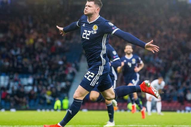 Oliver Burke celebrates scoring Scotland's second goal during the UEFA Euro 2020 Qualifying, Group I match at Hampden Park, Glasgow.