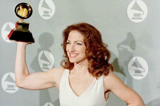 Estefan winning a Grammy in 1996. Picture: JEFF HAYNES/AFP/Getty Images)