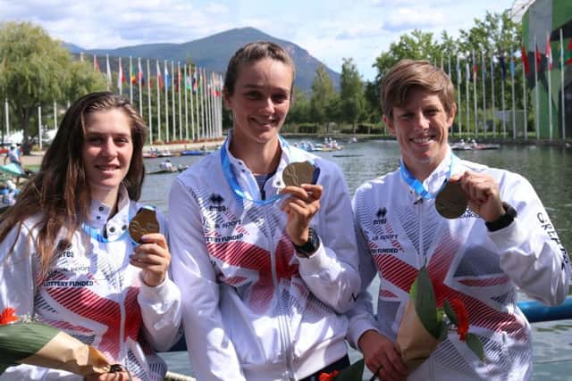 Kimberley Woods, Mallory Franklin and Fiona Pennie celebrate their gold medals. Picture: British Canoeing