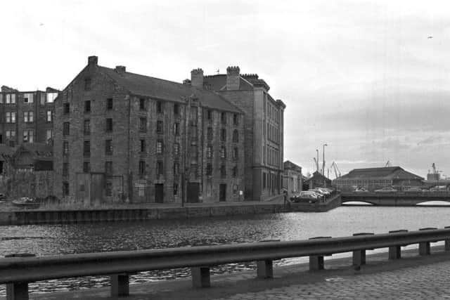 The derelict warehouses at Commercial Wharf by the Water of Leith, February 1982.