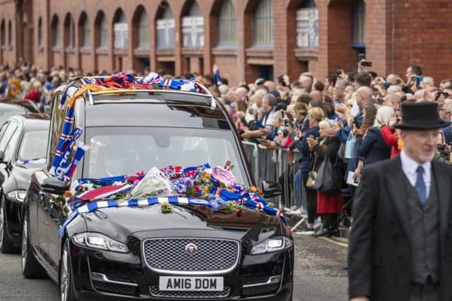 The hearse carrying Fernando Ricksen's body drives through Glasgow's streets