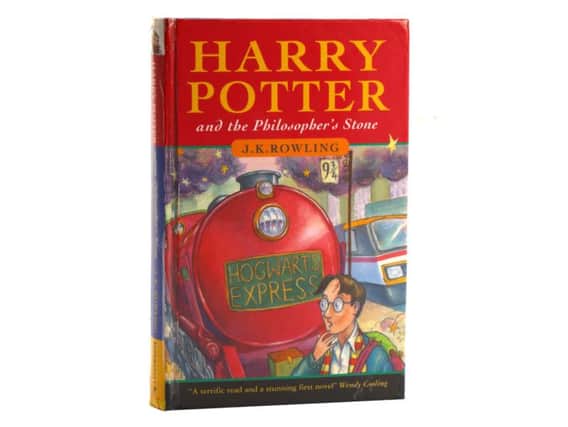 This rare edition of the first Harry Potter book has fetched more than 27,000 pounds at auction