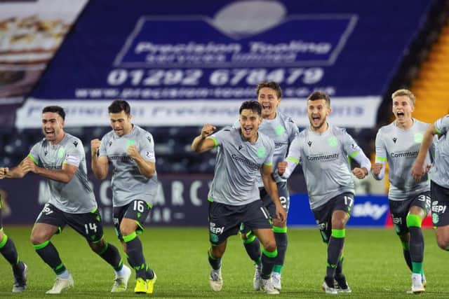 The Hibs players celebrate after winning the penalty shoot-out