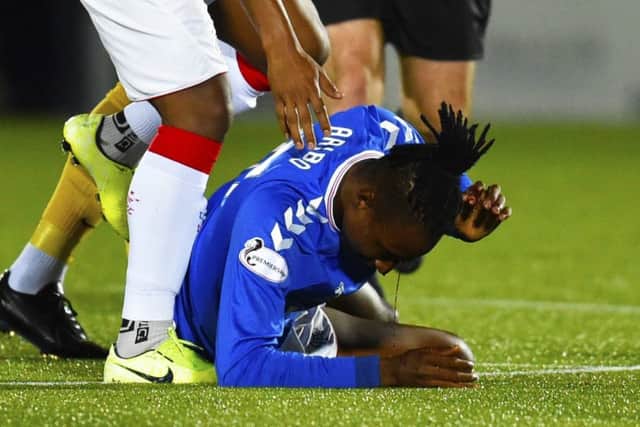 Joe Aribo needed 20 stitches in a head wound following an aerial clash with Ricki Lamie. Picture: Rob Casey/SNS