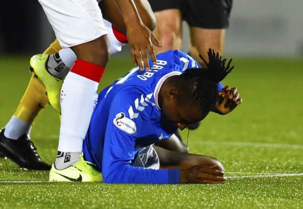 Joe Aribo needed 20 stitches in a head wound following an aerial clash with Ricki Lamie. Picture: Rob Casey/SNS