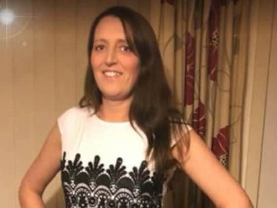 The mother-of-three, named locally as Elayne Stanley, was attacked in her house in Graham Road, Widnes, on Tuesday evening.