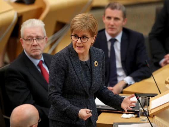 First Minister Nicola Sturgeon said the Electoral Commission was expert on referendum questions, but backed Michael Russell's position that the question need not be tested by the Commission for a future referendum.