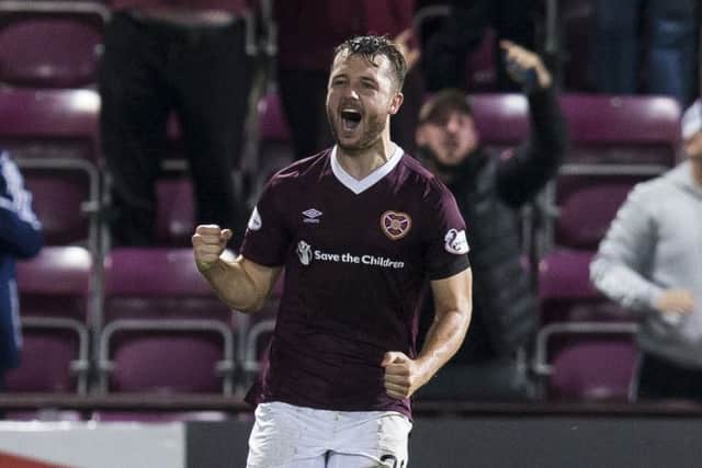 Craig Halkett celebrates his equaliser in added time which rescued Hearts from Betfred Cup defeat by Aberdeen on Wednesday. Picture: SNS.