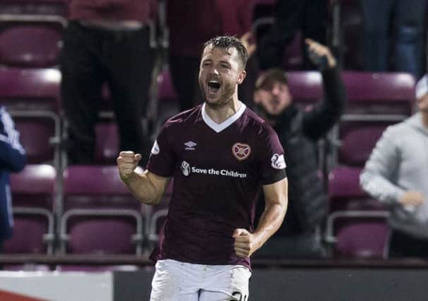 Craig Halkett celebrates his equaliser in added time which rescued Hearts from Betfred Cup defeat by Aberdeen on Wednesday. Picture: SNS.