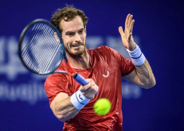 Andy Murray of Britain hits a return against Alex de Minaur of Australia during their men's singles second round match at the Zhuhai Championships tennis tournament in Zhuhai in China's southern Guangdong province on September 26, 2019. (Photo by STR / AFP) / China OUTSTR/AFP/Getty Images