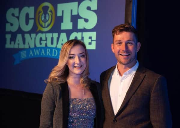 Scots Language Awards folk singer Iona Fyfe with awards presenter Alistair Heather