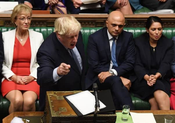Prime Minister Boris Johnson (C) gesturing while answering questions on the proroguing of Parliament. Pic: Getty Images