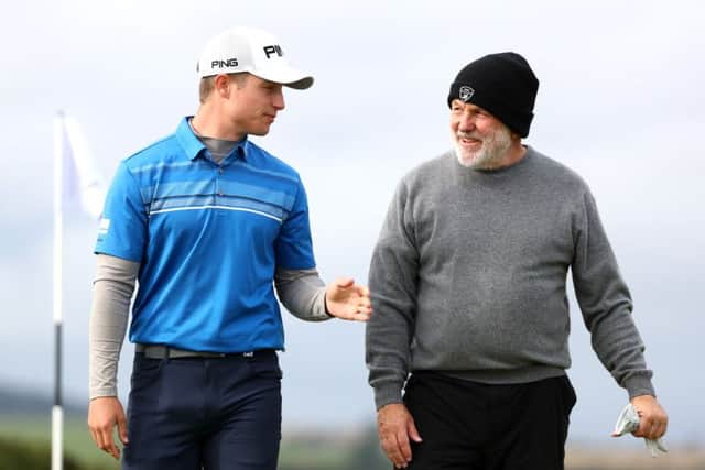 Scotland's Calum Hill with partner John Tyson during day two of the Alfred Dunhill Links Championship at the Old Course. Picture: Matthew Lewis/Getty Images