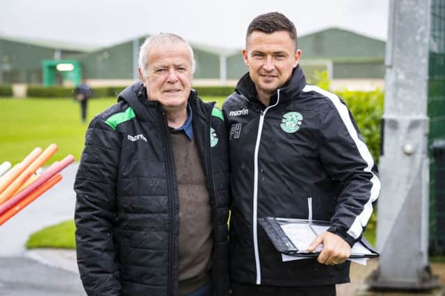 Hibs great Pat Stanton visited manager Paul Heckingbottom in training and will be guest of honour for the game against Celtic. Picture: Roddy Scott/SNS