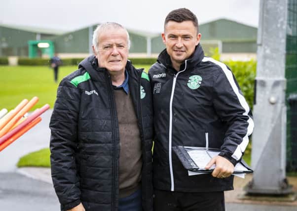 Hibs great Pat Stanton visited manager Paul Heckingbottom in training and will be guest of honour for the game against Celtic. Picture: Roddy Scott/SNS