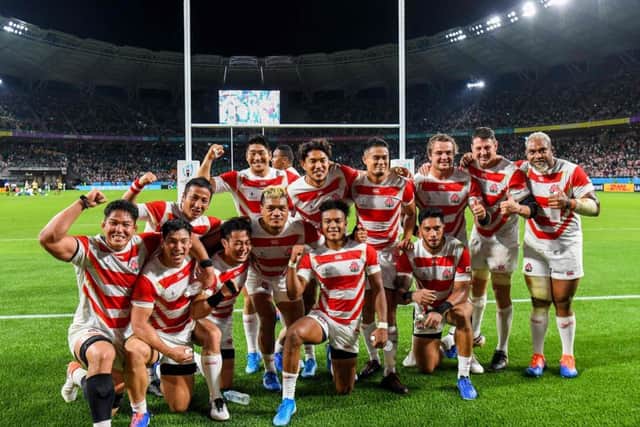 Japan's players celebrate victory over Ireland. Picture: William West/AFP/Getty Images