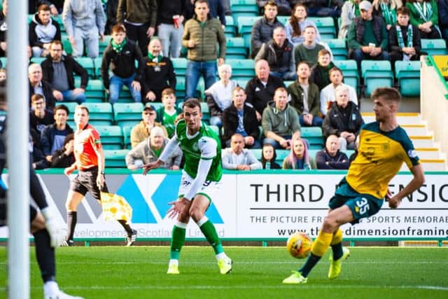 Kristoffer Ajer scores an own goal as Hibs go ahead.