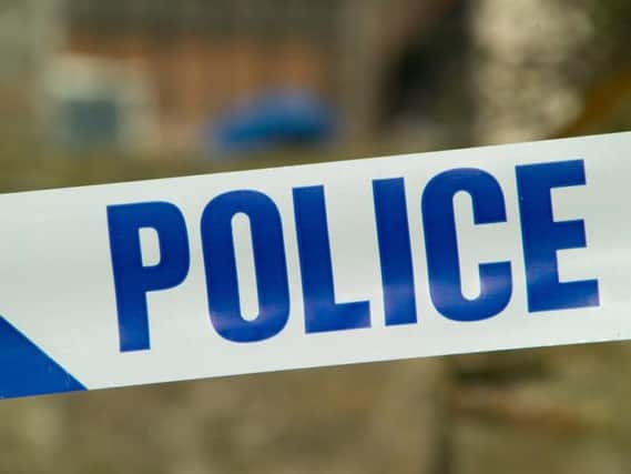 A man has been arrested following the death of a woman in an Aberdeen flat.