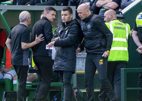 Hibs manager Paul Heckingbottom is led away after being sent off during the 1-1 draw at Easter Road. Picture: Bill Murray/SNS