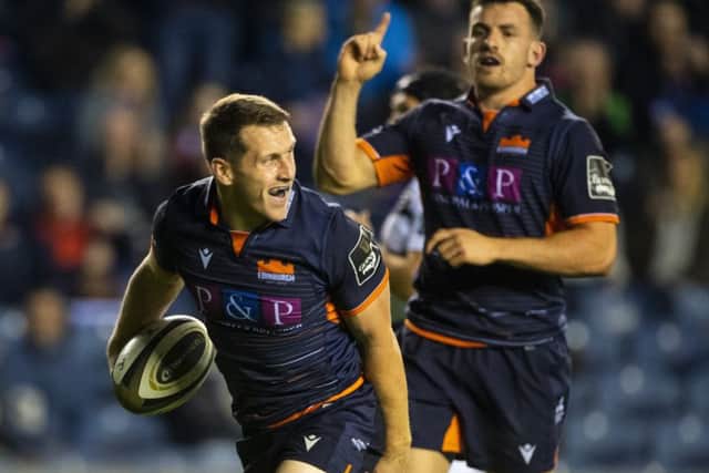 Mark Bennett celebrates the second try of his hat-trick against Zebre. Picture: Bill Murray/SNS