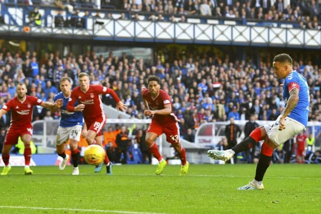 James Tavernier scores from the spot to give Rangers the lead against Aberdeen. Picture: SNS.