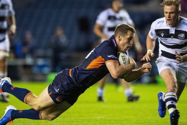 Mark Bennett dives over to score the second of his three tries for Edinburgh in their 50-15 Pro14 victory over Zebre. Picture: SNS/SRU