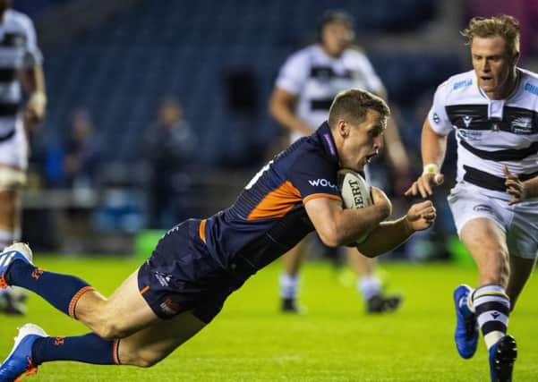 Mark Bennett dives over to score the second of his three tries for Edinburgh in their 50-15 Pro14 victory over Zebre. Picture: SNS/SRU