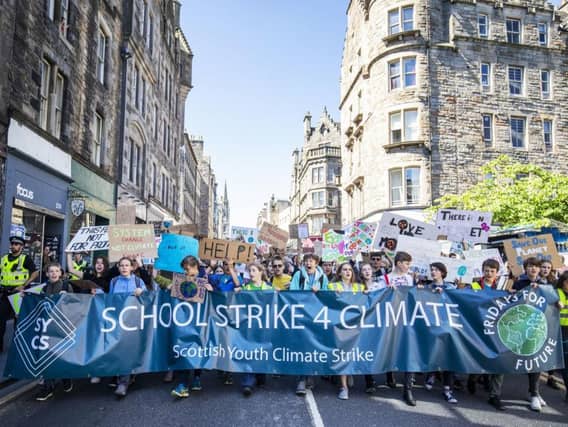 Students take part in the Scottish Youth Climate Strike, in Holyrood, Edinburgh, to demand urgent action to tackle climate change. Picture: PA