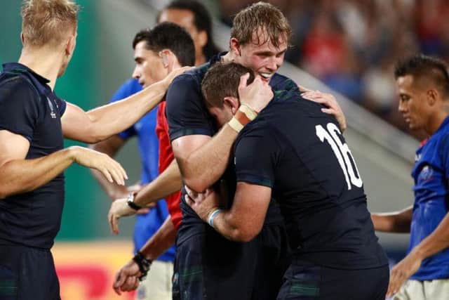 Scotland players celebrate at full-time in Kobe after getting the bonus-point 34-0 win over Samoa. Picture: Getty Images