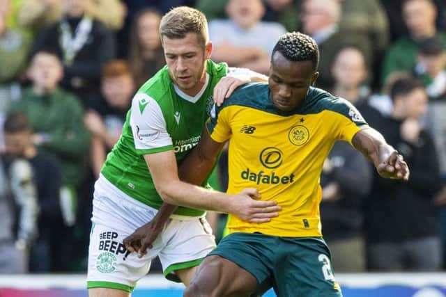 Boli Bolingoli tussles with Hibs Josh Vela last Saturday. Picture: SNS.