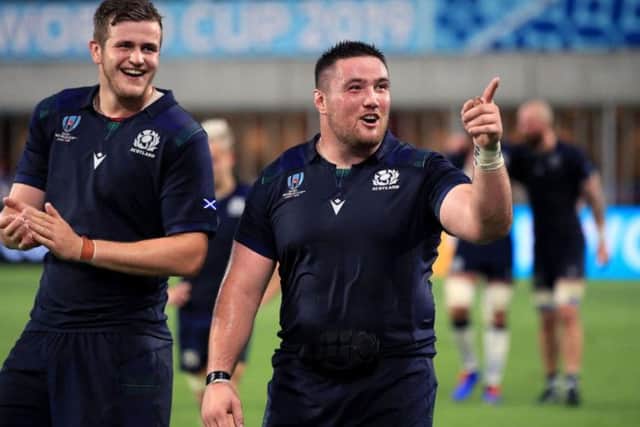 Scott Cummings (left) and Zander Fagerson are all smiles after victory over Samoa in Kobe