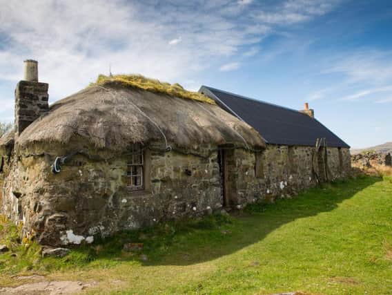 Sheila's Cottage on Ulva is being restored and rethatched using traditional materials from the island. PIC: Contributed.