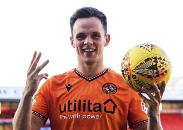 Lawrence Shankland celebrates his hat-trick for Dundee United against Morton. Picture: Ross Parker/SNS