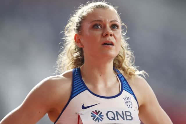 Beth Dobbin looks up to the scoreboard after her third place in the womens 200 metre heats was enough to secure a semi-final place. Picture: Maja Hitij/Getty