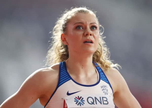 Beth Dobbin looks up to the scoreboard after her third place in the womens 200 metre heats was enough to secure a semi-final place. Picture: Maja Hitij/Getty