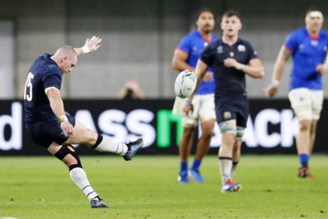 Scotland's Stuart Hogg kicks a drop goal during the Rugby World Cup game against Samoa in Kobe (Picture: Ichiro Sakano/Kyodo News via AP)