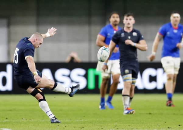 Scotland's Stuart Hogg kicks a drop goal during the Rugby World Cup game against Samoa in Kobe (Picture: Ichiro Sakano/Kyodo News via AP)