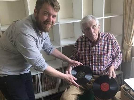 William Dean-Myatt (right) hands over the remaining shellac discs to the Library's Sound Collections Curator, Alistair Bell. Picture: The National Library of Scotland