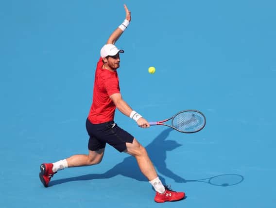 Andy Murray battled well against Matteo Berrettini to reach the second round