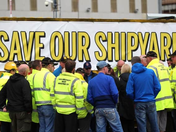 Workers at the Ulster shipyard, which has been saved by the sale
