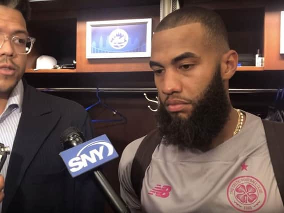 Amed Rosario (right) wearing Celtic's change kit in the Mets' locker room