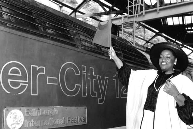 Jessye Norman waves off a train from Waverley Station in 1984 after naming it "Edinburgh International Festival"
