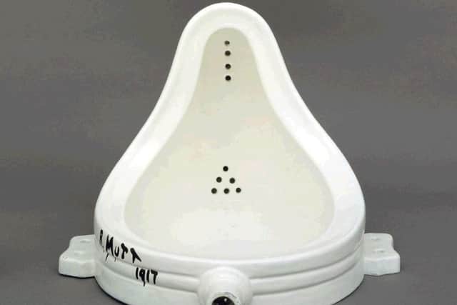 Marcel Duchamp's famous 1917 piece, Fountain. The upside-down urinal is one of the most influential modern works, inspiring artists from Damien Hirst to Tracey Emin. (Picture: PA handout/Tate Britain)