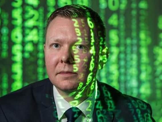 Scotland's tech industry supports almost 100,000 jobs, including DC Craig Potter, who works at the cyber crime operations unit at Police Scotland. Picture: Contributed