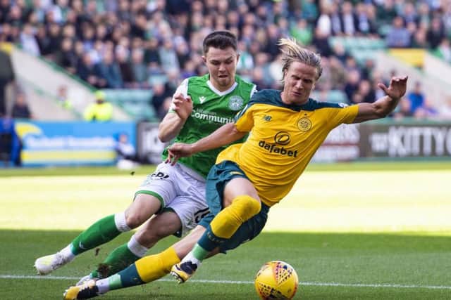 Celtics Moritz Bauer gets the better of Hibs Glenn Middleton last Saturday, and now switches his focus to the Europa League. Picture: SNS.