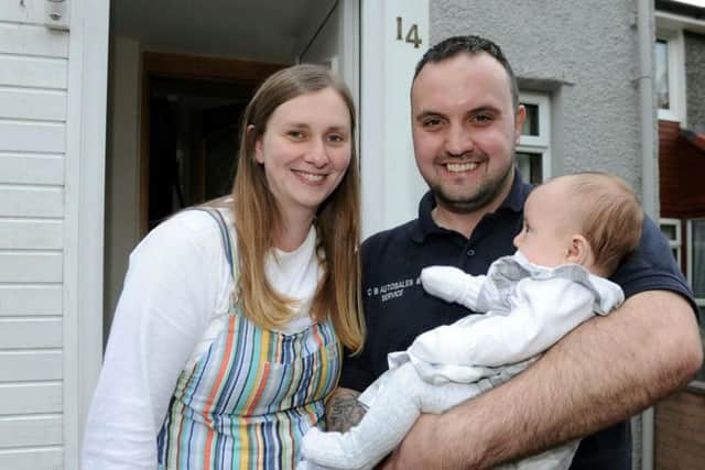 Terri and Calum with baby Hannah. Picture: SWNS