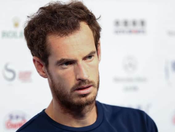 A tired-looking Andy Murray speaks to the media after his gruelling three-set encounter with Cameron Norrie