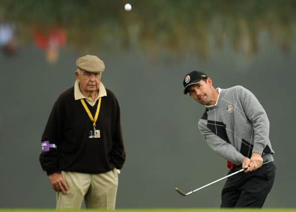 Padraig Harrington, right, is watched by coach Bob Torrance during a practice session for the 2010 Ryder Cup at Celtic Manor in Wales.
Picture: Glyn Kirk/AFP/Getty